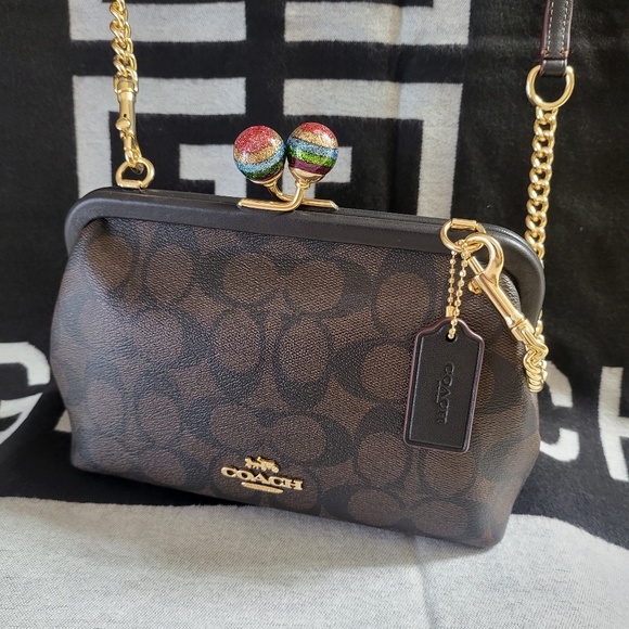 Coach Handbags - EUC Coach Kiss Lock crossbody bag NWT